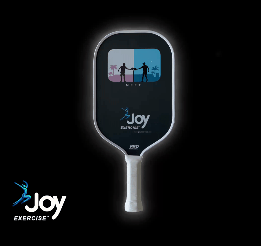 JoyExercise MEET pickleball paddle rotating on its axis, showing white grip, white edge guard, and logo with two players on the paddle face.